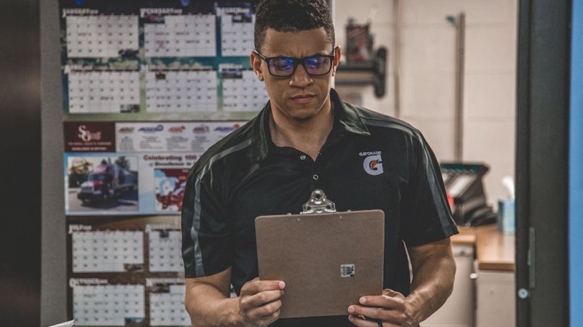 Hr manager reviewing employee work schedule document