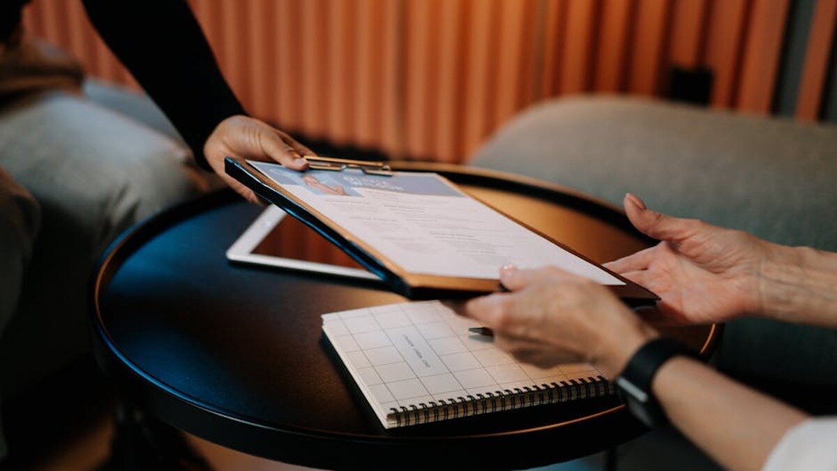 Hr manager reviewing employee work schedule document